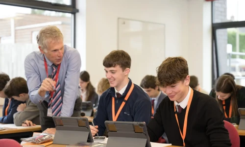 7_teacher talking to two male pupils - Nov 23